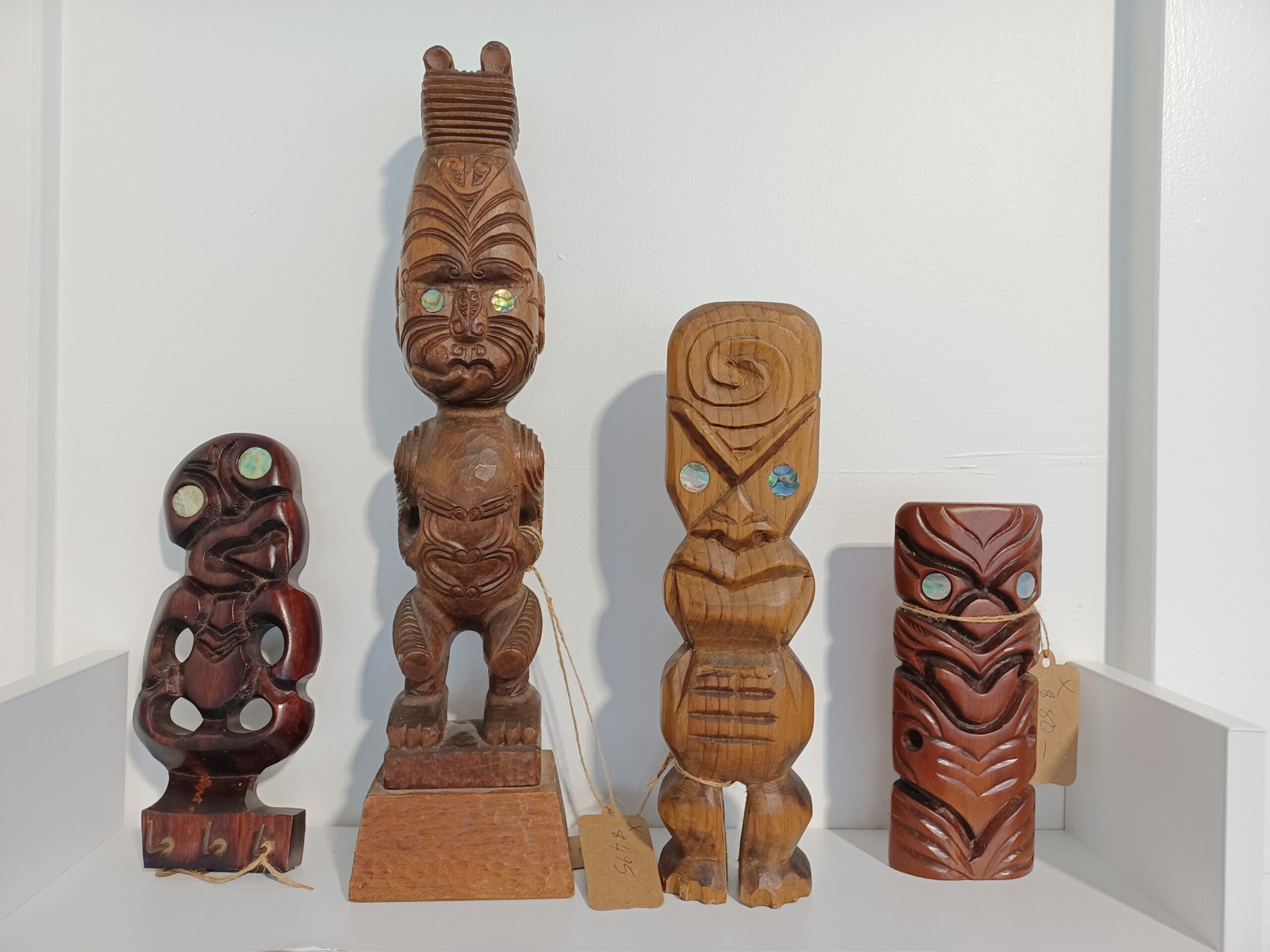 A collection of Maori art Tikis